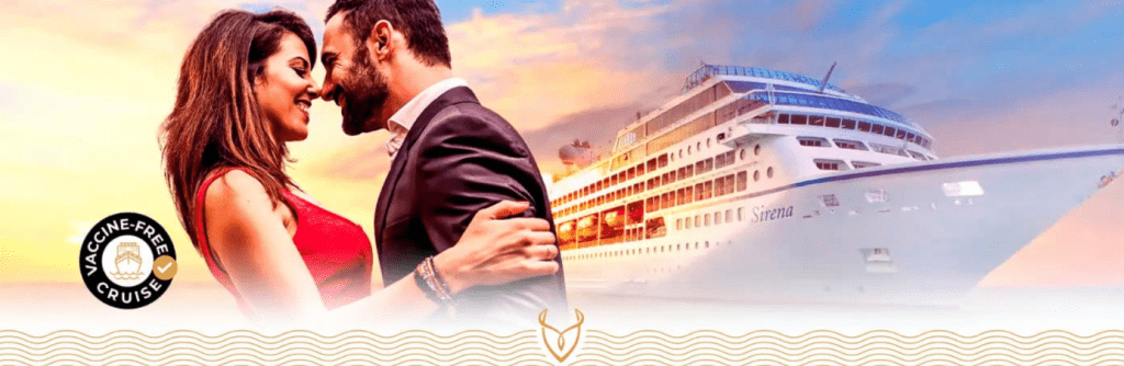 A couple smiling and embracing with a large cruise ship in the background during sunset.